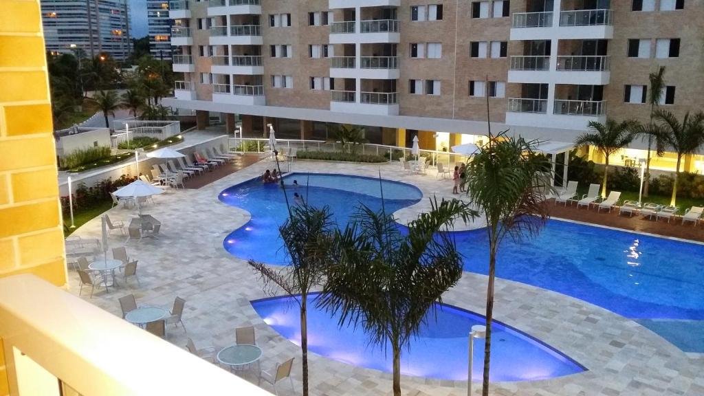 piscina do Jd. S. Lourenço - Riviera - Novo, 3 dorm, AC, 300m do mar, serviço de praia um airbnb na Riviera de Sâo Lourenço