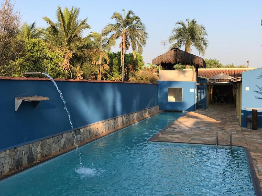 Piscina na Pousada Rosa dos Ventos em Delfinópolis.