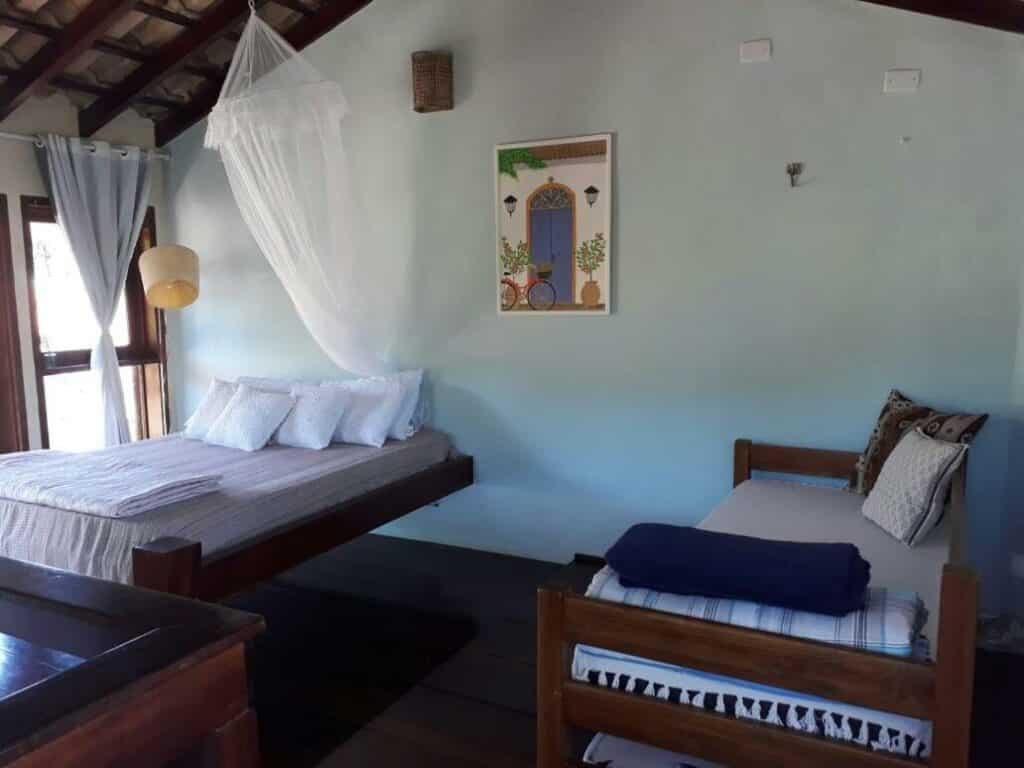 quarto da Mandacaru Chalés e Suítes Itamambuca