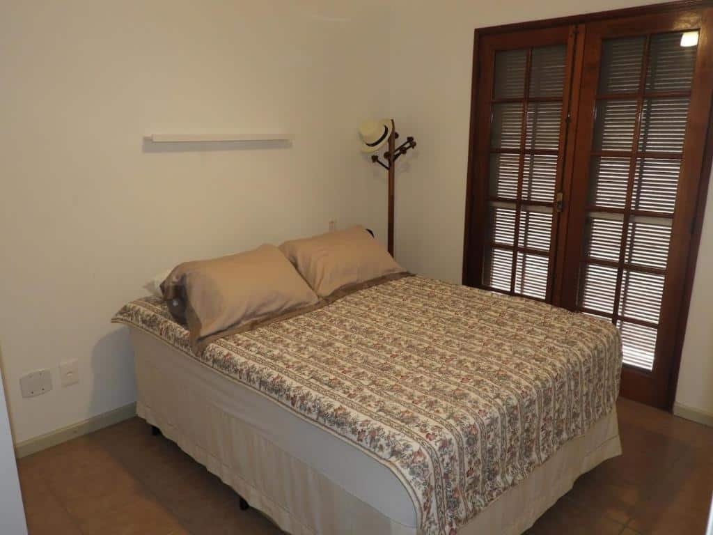 quarto com cama de casal no Sonho Riviera, Serviço de Praia, Piscina e Natureza