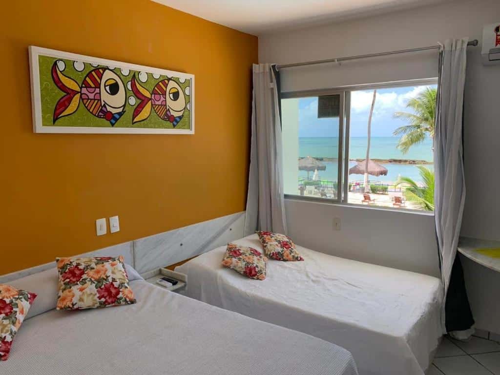 quarto do Flat com Vista do Mar