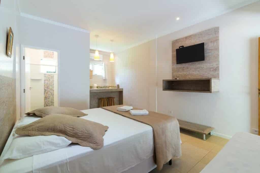 quarto das Suites Prime em Itamambuca
